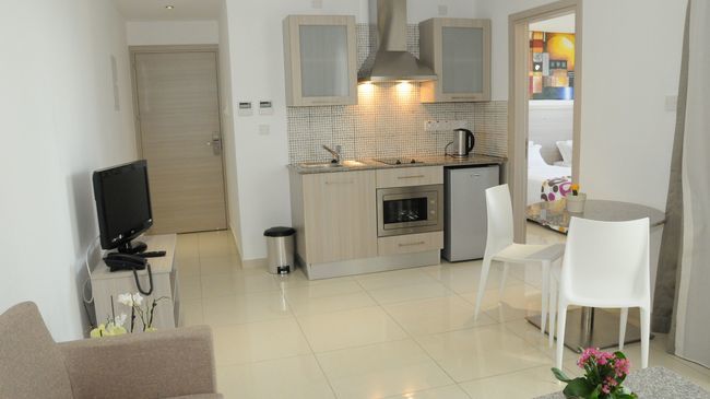 Frixos Suites Hotel Apts Oroklini Logotipo foto